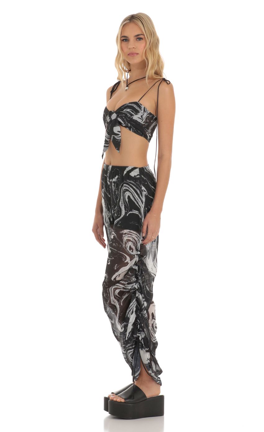 Picture Ruched Pant Set in Black Swirl. Source: https://media-img.lucyinthesky.com/data/Jun23/850xAUTO/4f2d9ec4-b82e-4a01-94a6-062c28ebd562.jpg