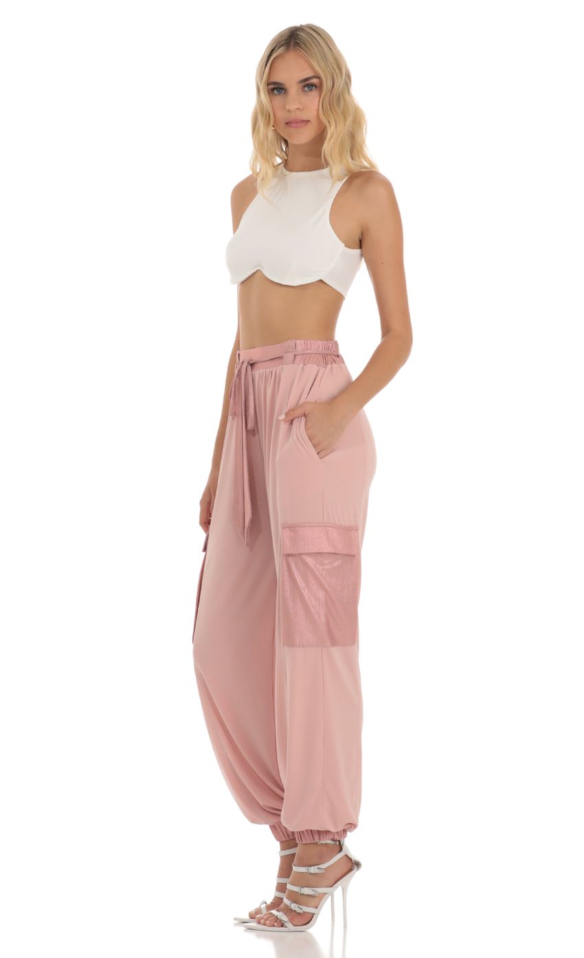 Picture Shimmer Pants in Pink. Source: https://media-img.lucyinthesky.com/data/Jun23/850xAUTO/624acbb0-b89c-4634-acd1-e7a7a15d03b9.jpg
