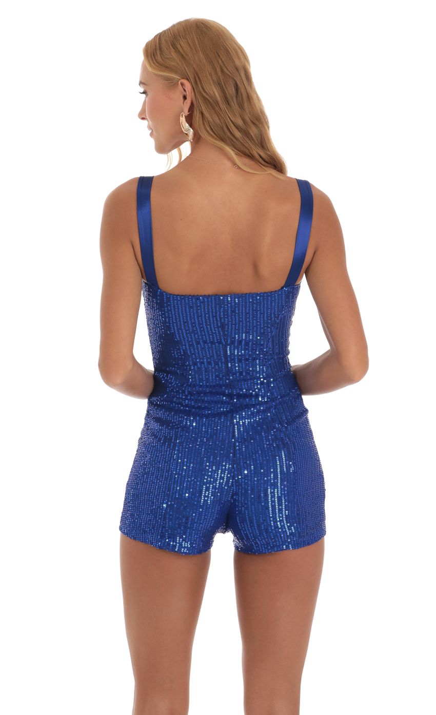 Picture Sequin Hook and Eye Romper in Blue. Source: https://media-img.lucyinthesky.com/data/Jun23/850xAUTO/7013db74-5f33-4a0b-b244-0a55bd53a115.jpg