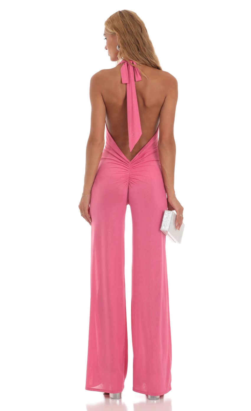 Picture Cath Foiled Open Back Jumpsuit in Pink. Source: https://media-img.lucyinthesky.com/data/Jun23/850xAUTO/87c3f52b-4b5e-461c-8179-ce6648db8a32.jpg