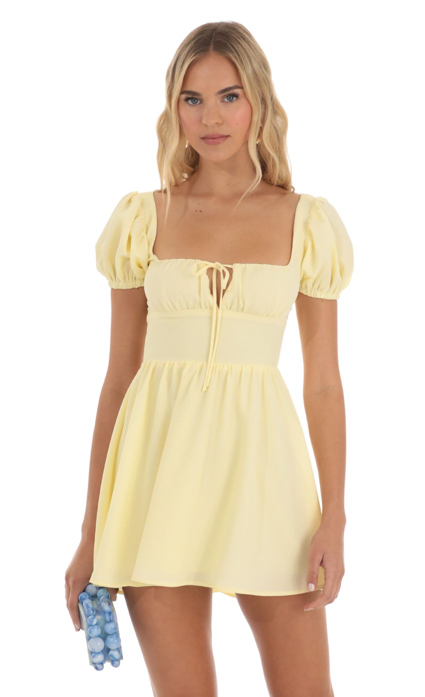 Picture Puff Sleeve Mini Dress in Yellow. Source: https://media-img.lucyinthesky.com/data/Jun23/850xAUTO/91444d61-d9ca-4076-924f-17e1638f7fb0.jpg