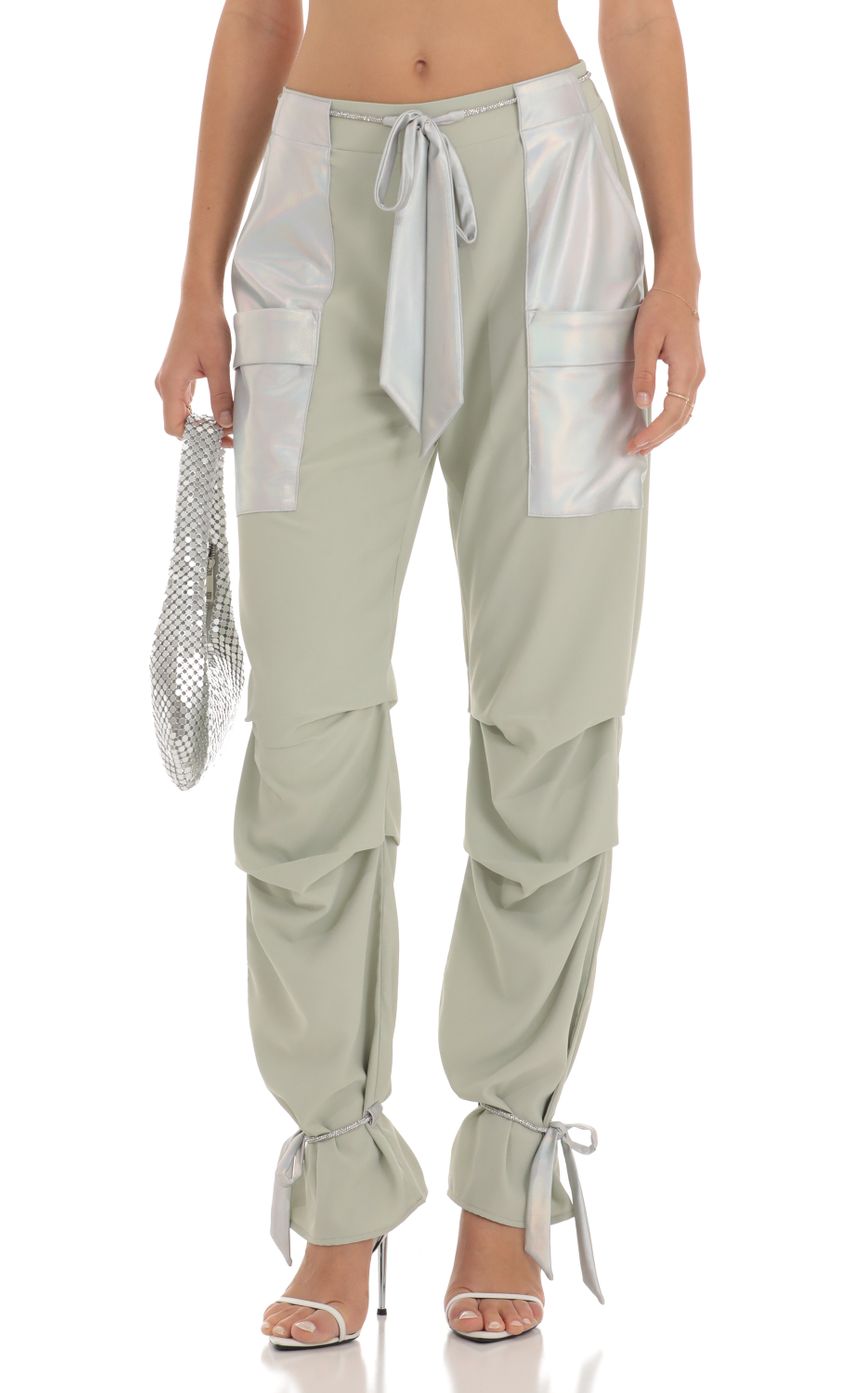 Picture Rhinestone Pants in Sage Green. Source: https://media-img.lucyinthesky.com/data/Jun23/850xAUTO/977e3b2c-7e52-491c-b1af-a6584580c938.jpg