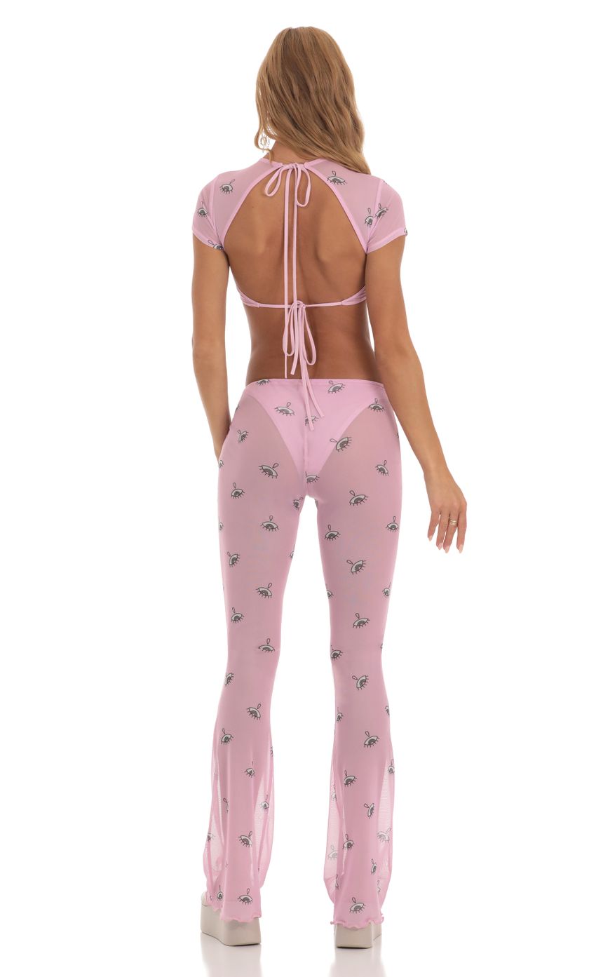 Picture Mesh Eye Print Three Piece Pant Set in Pink. Source: https://media-img.lucyinthesky.com/data/Jun23/850xAUTO/a293a514-ddb7-4725-af8d-9423baa9551a.jpg