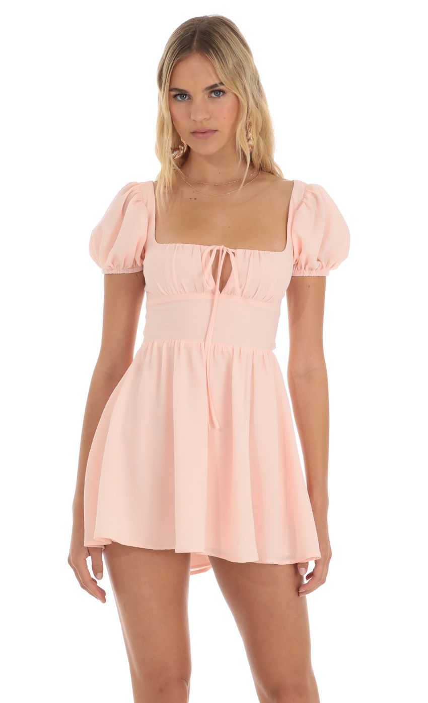 Picture Puff Sleeve Mini Dress in Pink. Source: https://media-img.lucyinthesky.com/data/Jun23/850xAUTO/af52d995-8dee-43e0-a462-19540dc0759a.jpg