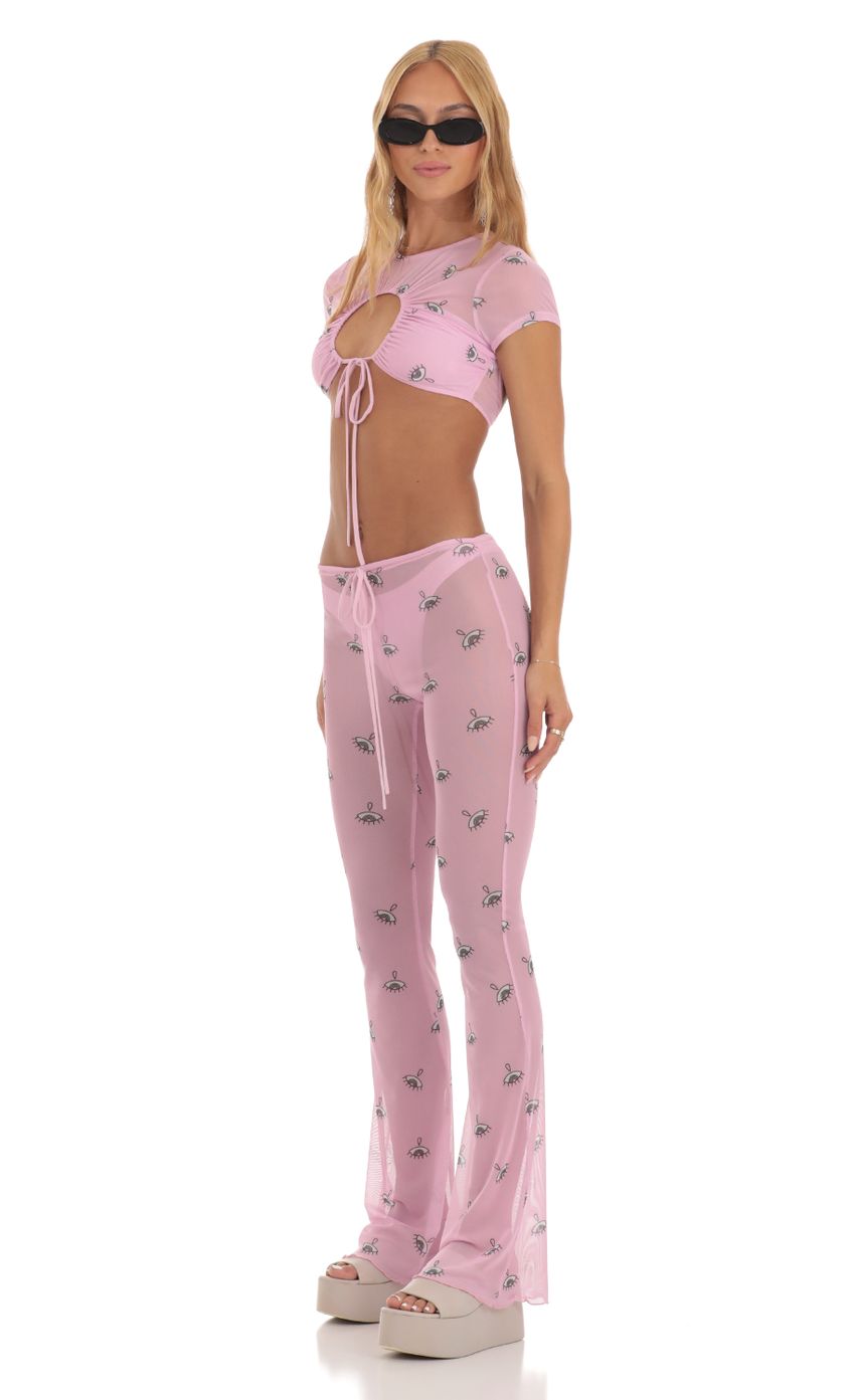 Picture Mesh Eye Print Three Piece Pant Set in Pink. Source: https://media-img.lucyinthesky.com/data/Jun23/850xAUTO/bb5e1aa4-f7b8-457a-987d-8f9c1b1d4f15.jpg