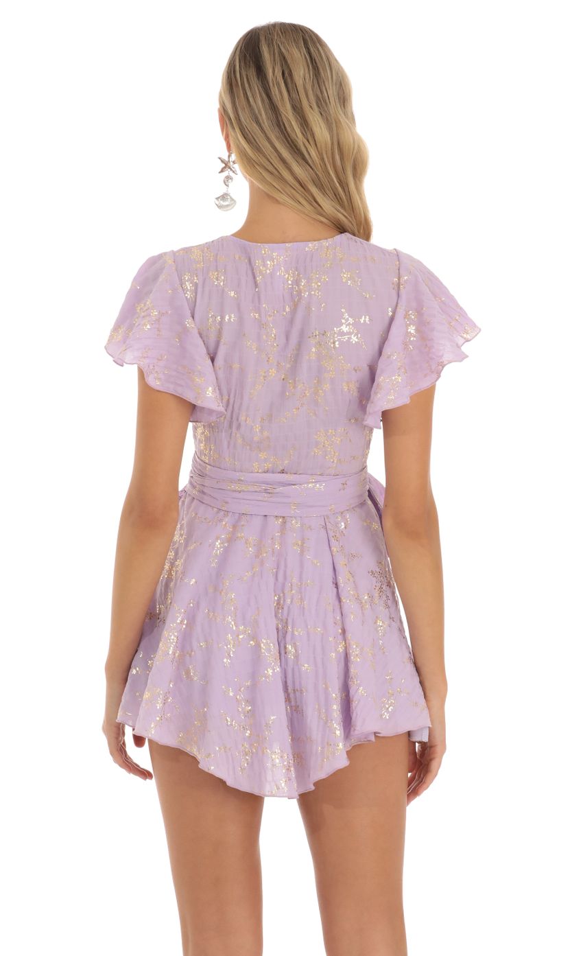 Picture Eliza Shimmer Floral Wrap Dress in Purple. Source: https://media-img.lucyinthesky.com/data/Jun23/850xAUTO/bfff7b0b-a4d6-468e-9b4d-7515050d4d3c.jpg