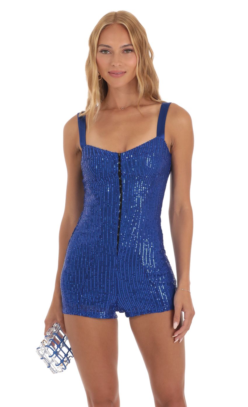 Picture Sequin Hook and Eye Romper in Blue. Source: https://media-img.lucyinthesky.com/data/Jun23/850xAUTO/cc1c1a5e-ea1e-46c1-bf34-7fc0d87d2fd8.jpg