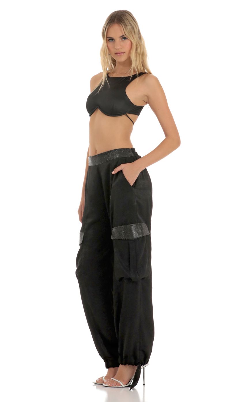 Picture Rhinestone Satin Pants in Black. Source: https://media-img.lucyinthesky.com/data/Jun23/850xAUTO/ed58b9ab-4c9d-41ac-8e03-4d7bc4acf9a4.jpg