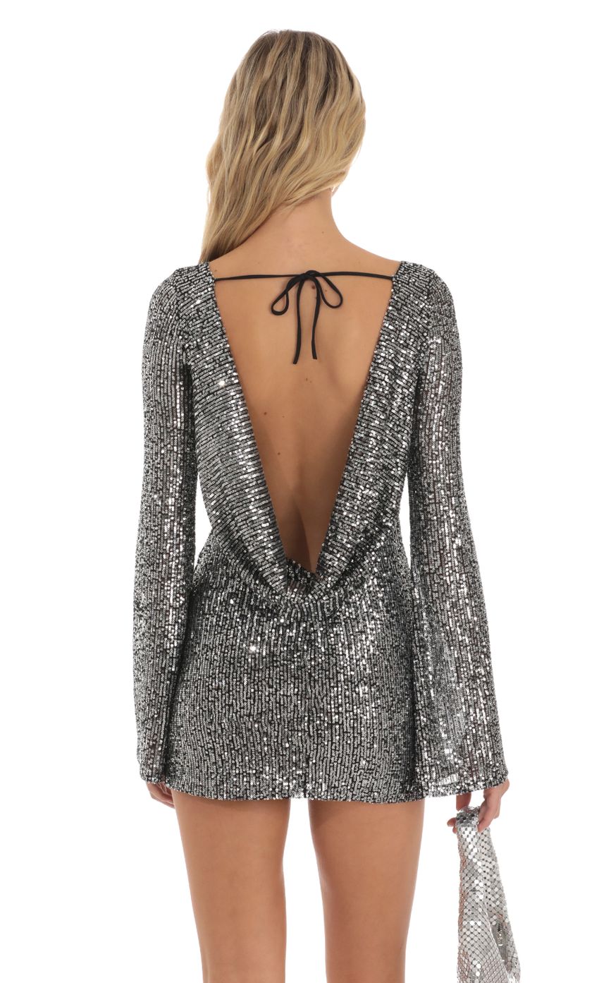 Picture Silver Sequin Draped Open Back Dress in Black. Source: https://media-img.lucyinthesky.com/data/Jun23/850xAUTO/f2242880-23c2-4722-8774-b4be40a2a574.jpg