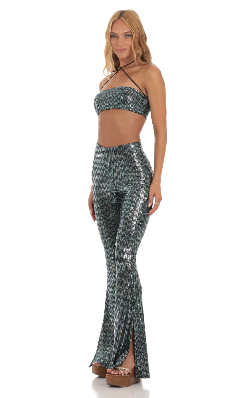 Picture Holographic Green Sequin Two Piece Set in Black. Source: https://media-img.lucyinthesky.com/data/Jun23/850xAUTO/fe79b0ad-a2b7-48db-a6ae-c85fed63c7e3.jpg
