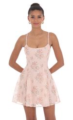 Picture Floral Crossback Fit and Flare Dress in Pink. Source: https://media-img.lucyinthesky.com/data/Jun24/150xAUTO/7db296fb-2e37-4ef0-af9a-e5a7e6aa792b.jpg