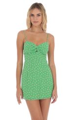 Picture Evelyn Floral Front Twist Dress in Green. Source: https://media-img.lucyinthesky.com/data/Jun24/150xAUTO/d0d20305-94e4-408d-be59-0fa7bd473614.jpg