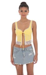 Picture Lace Vest Top in Yellow. Source: https://media-img.lucyinthesky.com/data/Jun24/150xAUTO/dedb36a0-ce7e-4447-a945-3f64cf9d6016.jpg