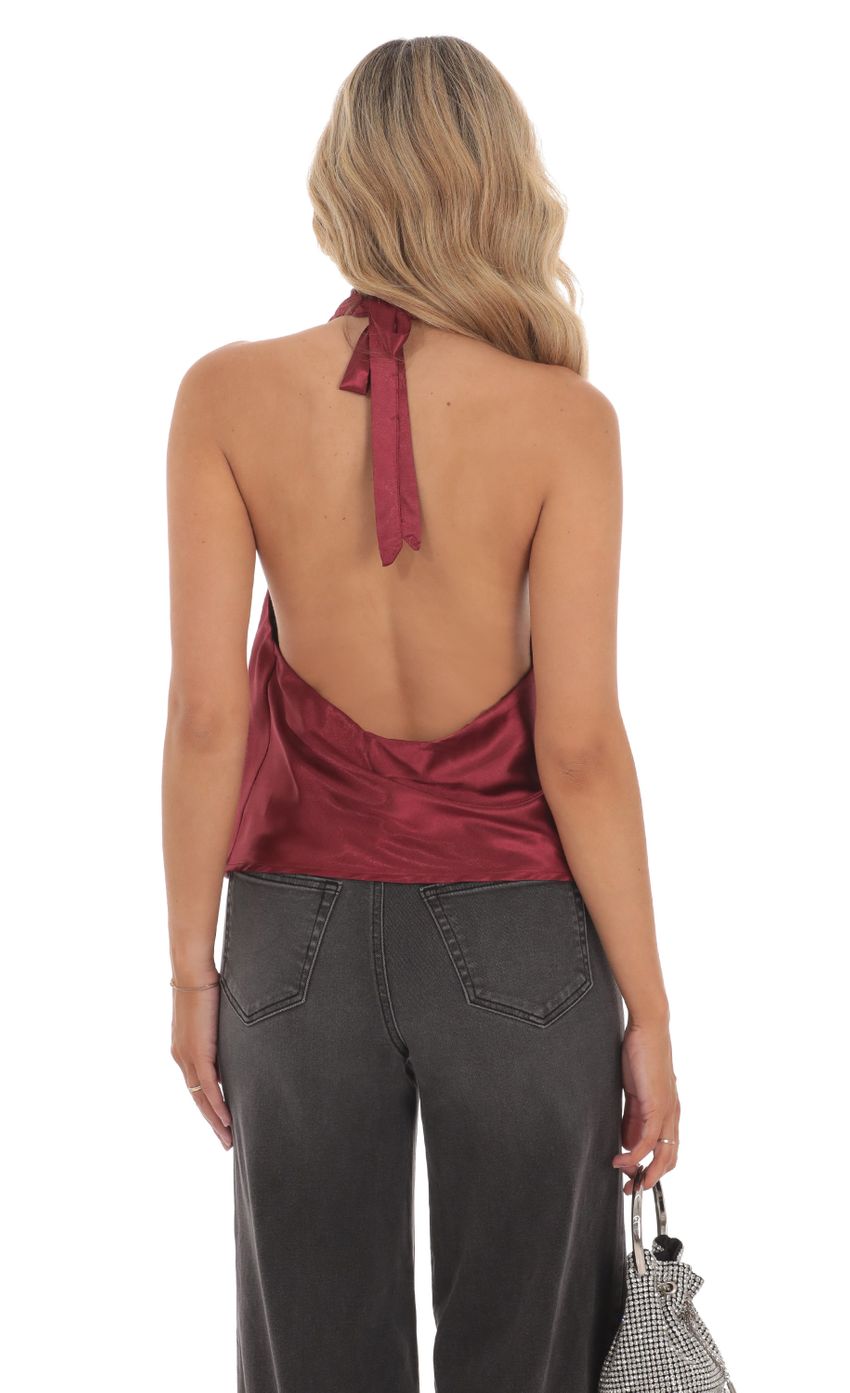 Picture Mock Neck Satin Top in Burgundy. Source: https://media-img.lucyinthesky.com/data/Jun24/850xAUTO/162f0a09-3b36-4875-8a69-50a14f16b930.jpg