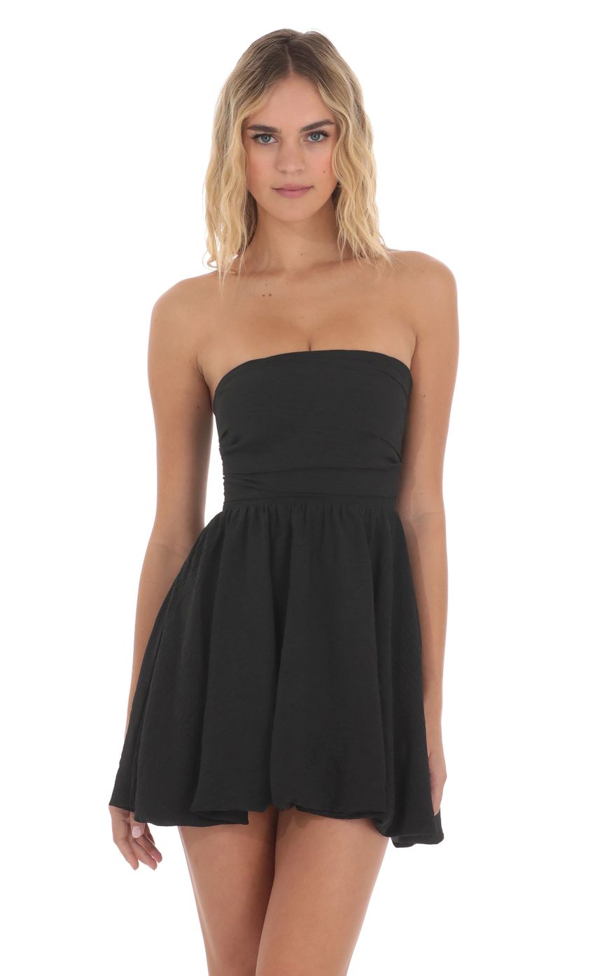 Picture Strapless Bubble Dress in Black. Source: https://media-img.lucyinthesky.com/data/Jun24/850xAUTO/167daf12-9e4a-4c1c-8864-3f6832a14324.jpg