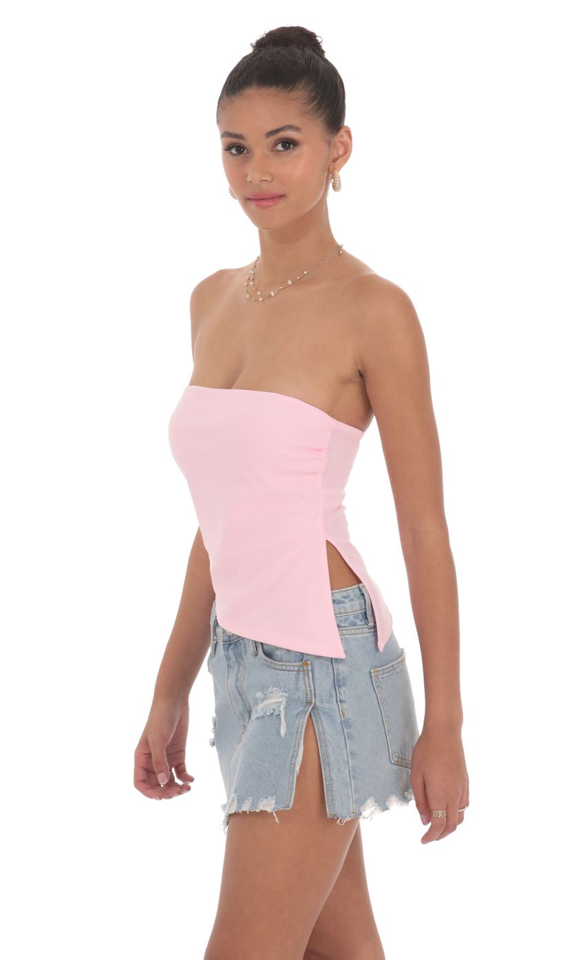 Picture Strapless Side Slit Top in Pink. Source: https://media-img.lucyinthesky.com/data/Jun24/850xAUTO/29139002-8d45-4ba8-b8da-bb5f1c2ade15.jpg