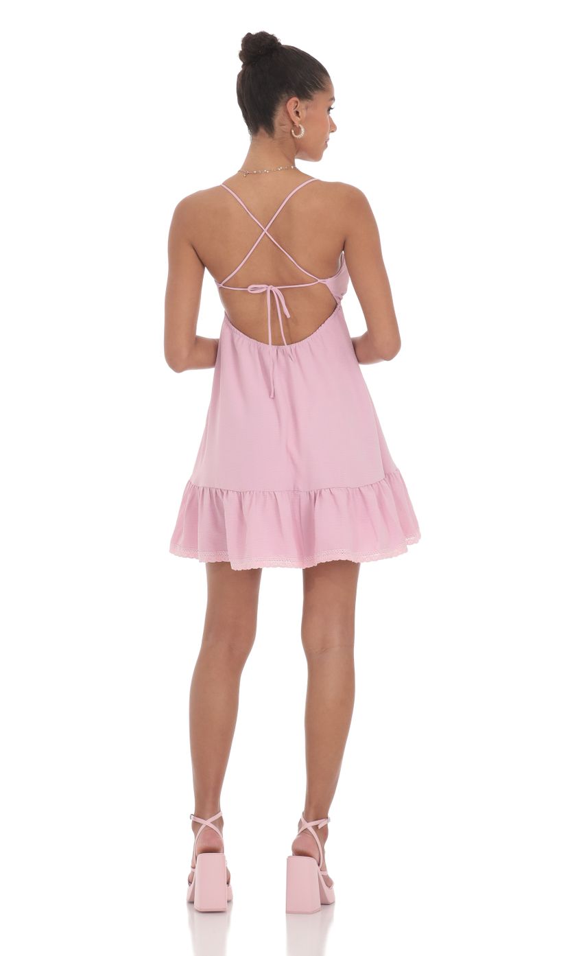 Picture Front Tie Babydoll Dress in Pink. Source: https://media-img.lucyinthesky.com/data/Jun24/850xAUTO/38dec3b2-9dbc-4b59-a1d3-86ffc8360bbb.jpg
