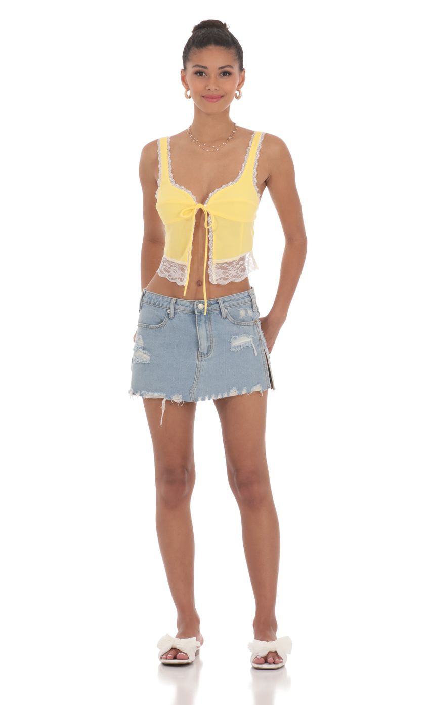 Picture Lace Vest Top in Yellow. Source: https://media-img.lucyinthesky.com/data/Jun24/850xAUTO/39879d76-7d70-45ac-97f8-bff9489cfdac.jpg