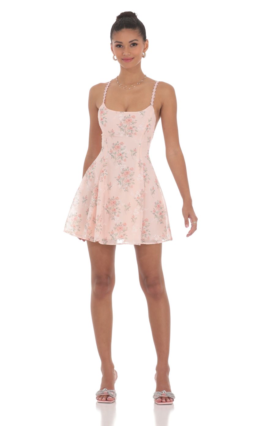Picture Floral Crossback Fit and Flare Dress in Pink. Source: https://media-img.lucyinthesky.com/data/Jun24/850xAUTO/3c85b545-e623-417f-80ac-66e038dd44e3.jpg