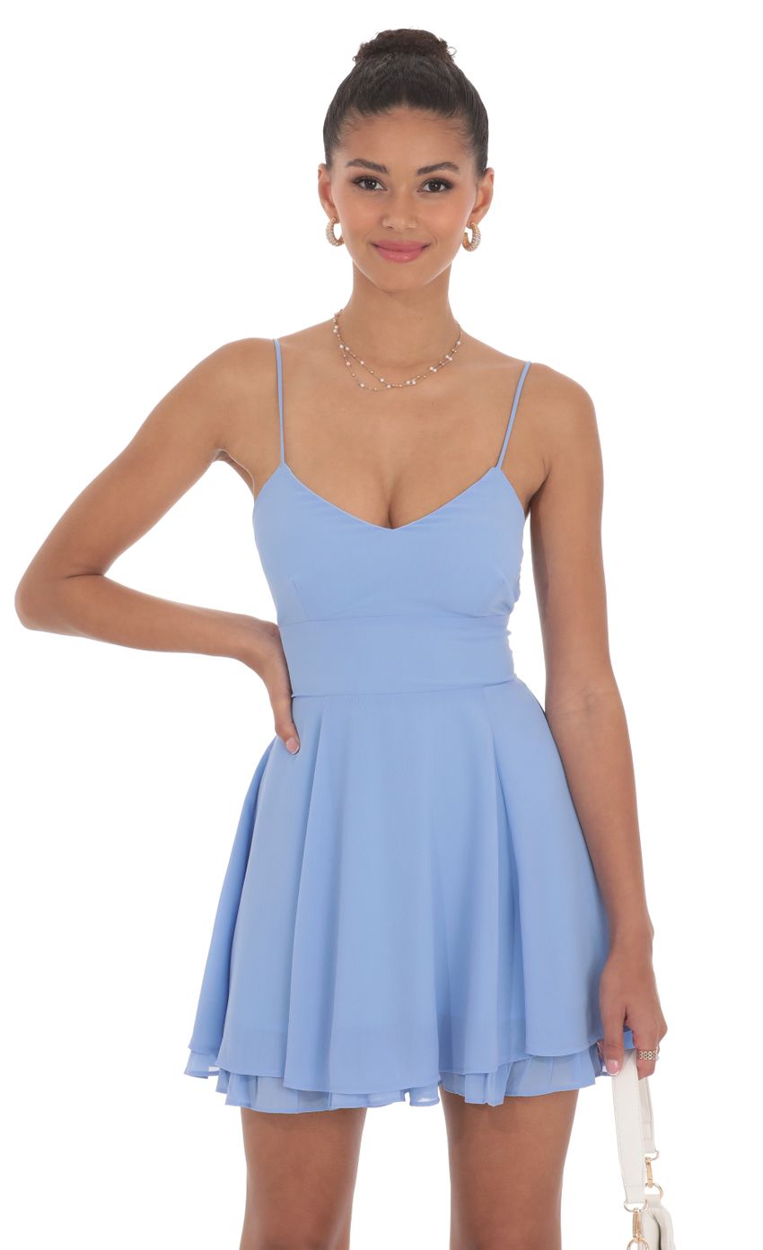 Picture Chiffon V-Neck Fit and Flare Dress in Blue. Source: https://media-img.lucyinthesky.com/data/Jun24/850xAUTO/618b25f1-a346-4c9d-8e07-0cc5a88fc947.jpg