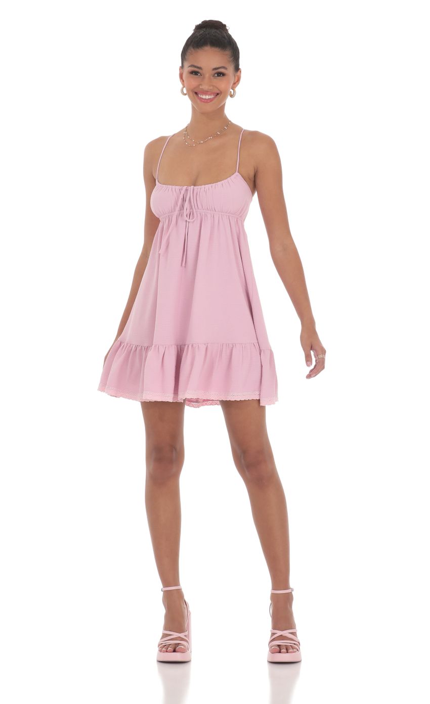 Picture Front Tie Babydoll Dress in Pink. Source: https://media-img.lucyinthesky.com/data/Jun24/850xAUTO/6a2fada7-0c6b-4247-8b20-aecc609a1cdd.jpg