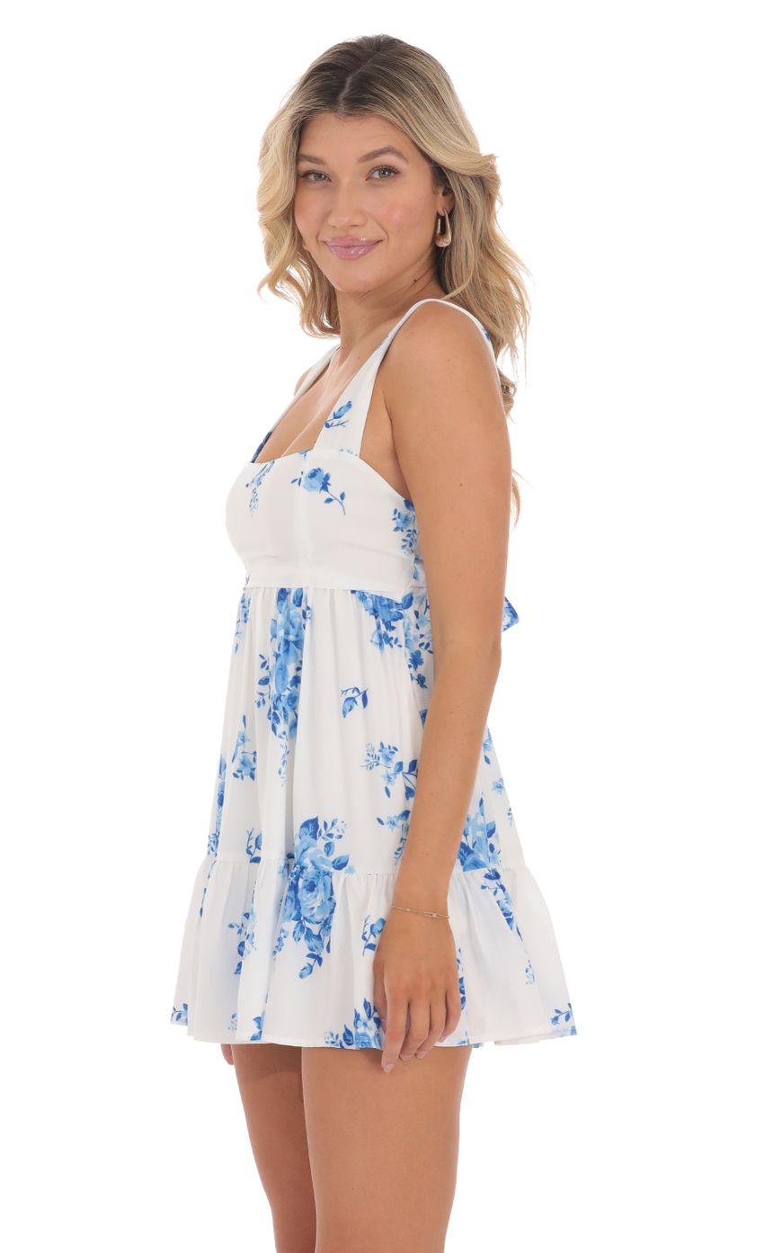 Picture Floral Square Neck Babydoll Dress in White. Source: https://media-img.lucyinthesky.com/data/Jun24/850xAUTO/b84d949b-ea7e-4c26-b49c-84652edf10fc.jpg