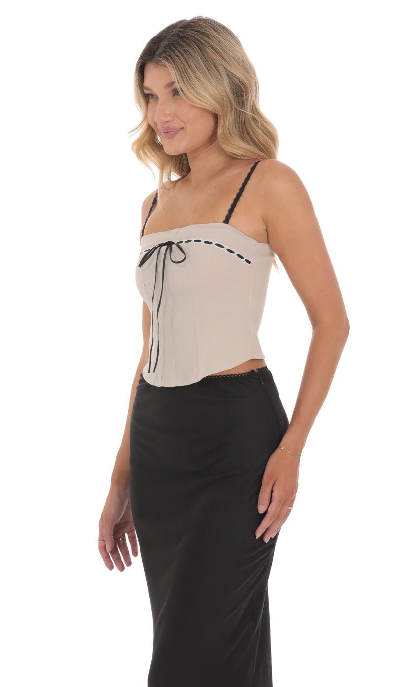 Picture Ribbon Lace Top in Taupe. Source: https://media-img.lucyinthesky.com/data/Jun24/850xAUTO/bc30143b-1a50-4ad7-92aa-6b6159bc7773.jpg