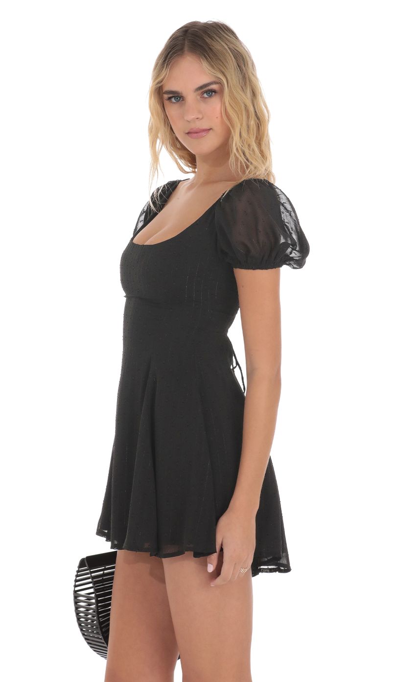 Picture Dotted Shimmer Puff Sleeve Dress in Black. Source: https://media-img.lucyinthesky.com/data/Jun24/850xAUTO/c7029bea-9407-4b97-813f-abeb9adcea15.jpg
