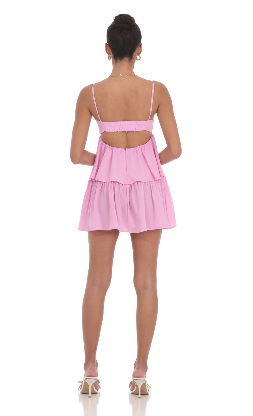 Picture Ruffle Front Tie Dress in Pink. Source: https://media-img.lucyinthesky.com/data/Jun24/850xAUTO/cb3c6254-dff7-4d9a-b8e5-6953a11cf21f.jpg
