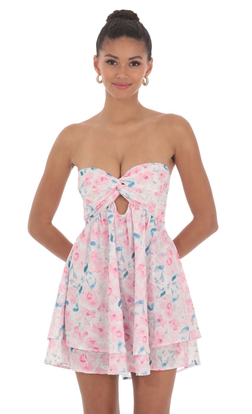 Picture Floral Cutout Babydoll Dress in White. Source: https://media-img.lucyinthesky.com/data/Jun24/850xAUTO/cdf3df31-9fd6-42e8-8352-ee9b88a82430.jpg