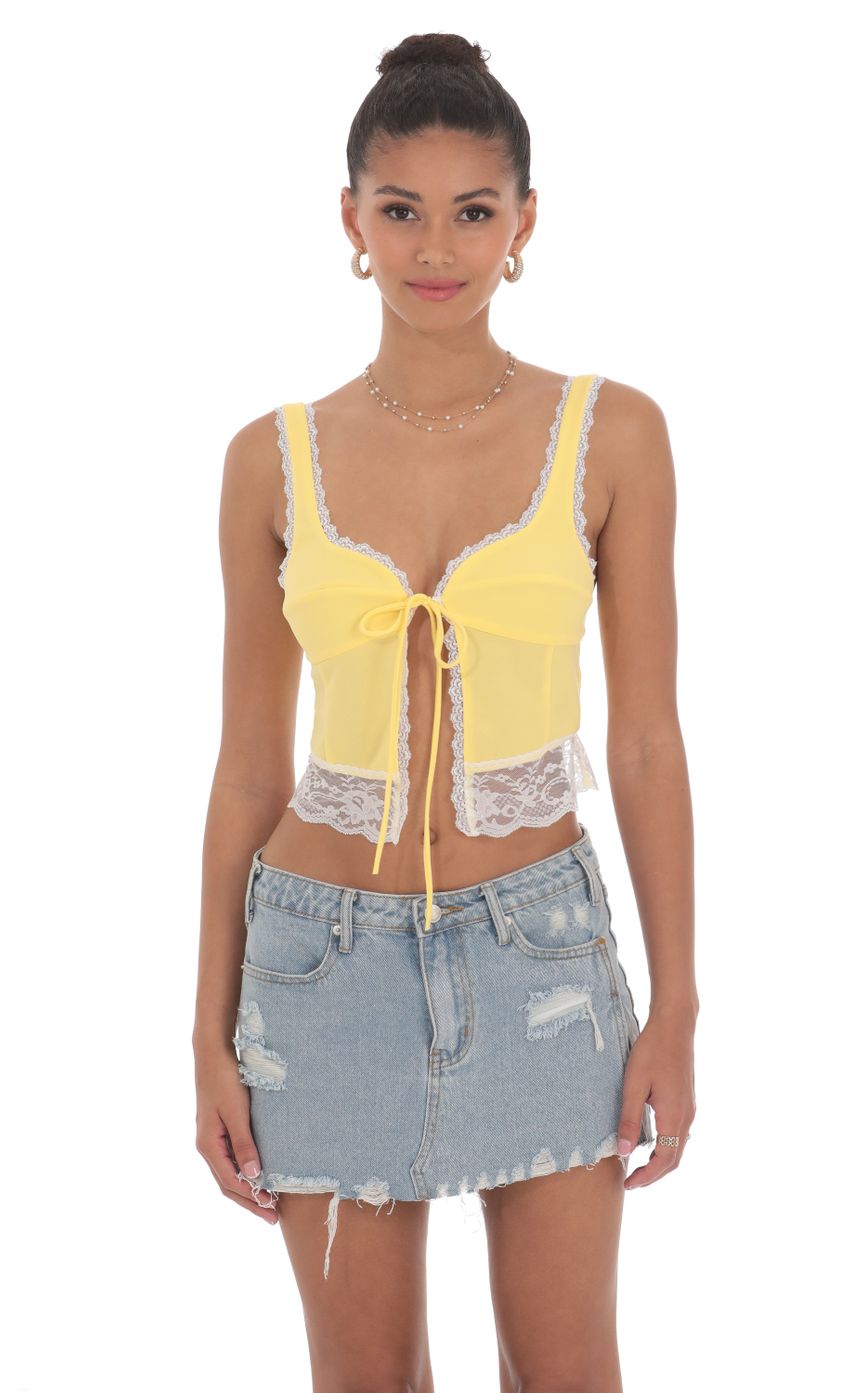 Picture Lace Vest Top in Yellow. Source: https://media-img.lucyinthesky.com/data/Jun24/850xAUTO/dedb36a0-ce7e-4447-a945-3f64cf9d6016.jpg