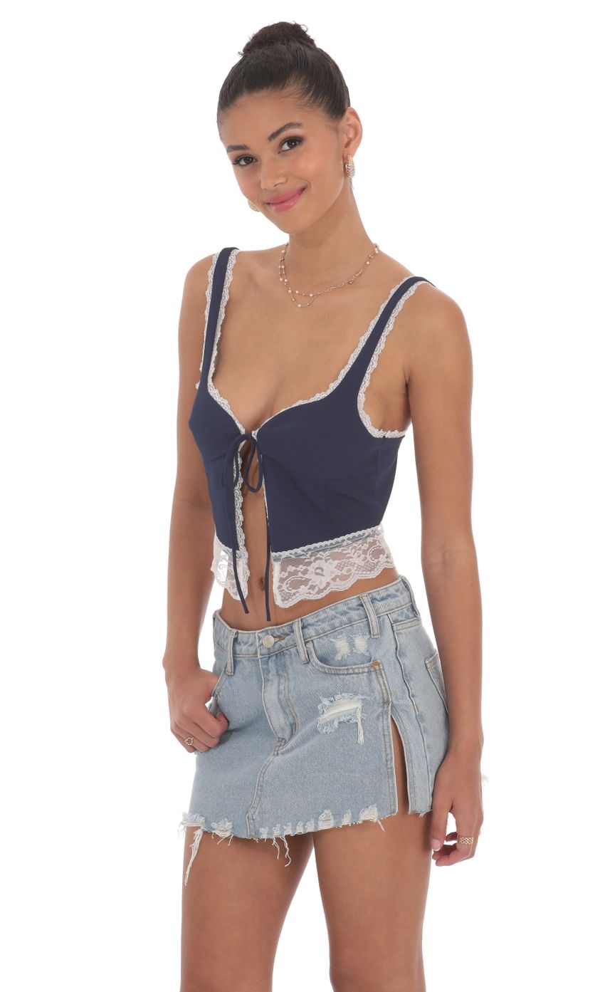Picture Lace Vest Top in Navy. Source: https://media-img.lucyinthesky.com/data/Jun24/850xAUTO/e621610b-9c04-4c66-85f3-9a22b42ce5e7.jpg