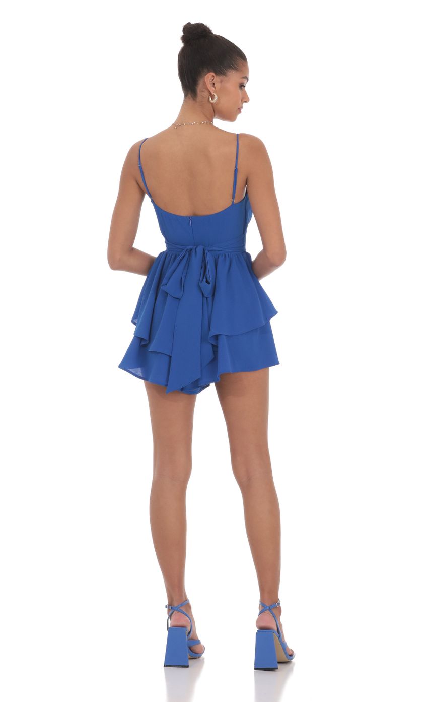 Picture Ruffle Romper in Blue. Source: https://media-img.lucyinthesky.com/data/Jun24/850xAUTO/e76c4717-5146-4b8c-9b06-72749ccaa054.jpg