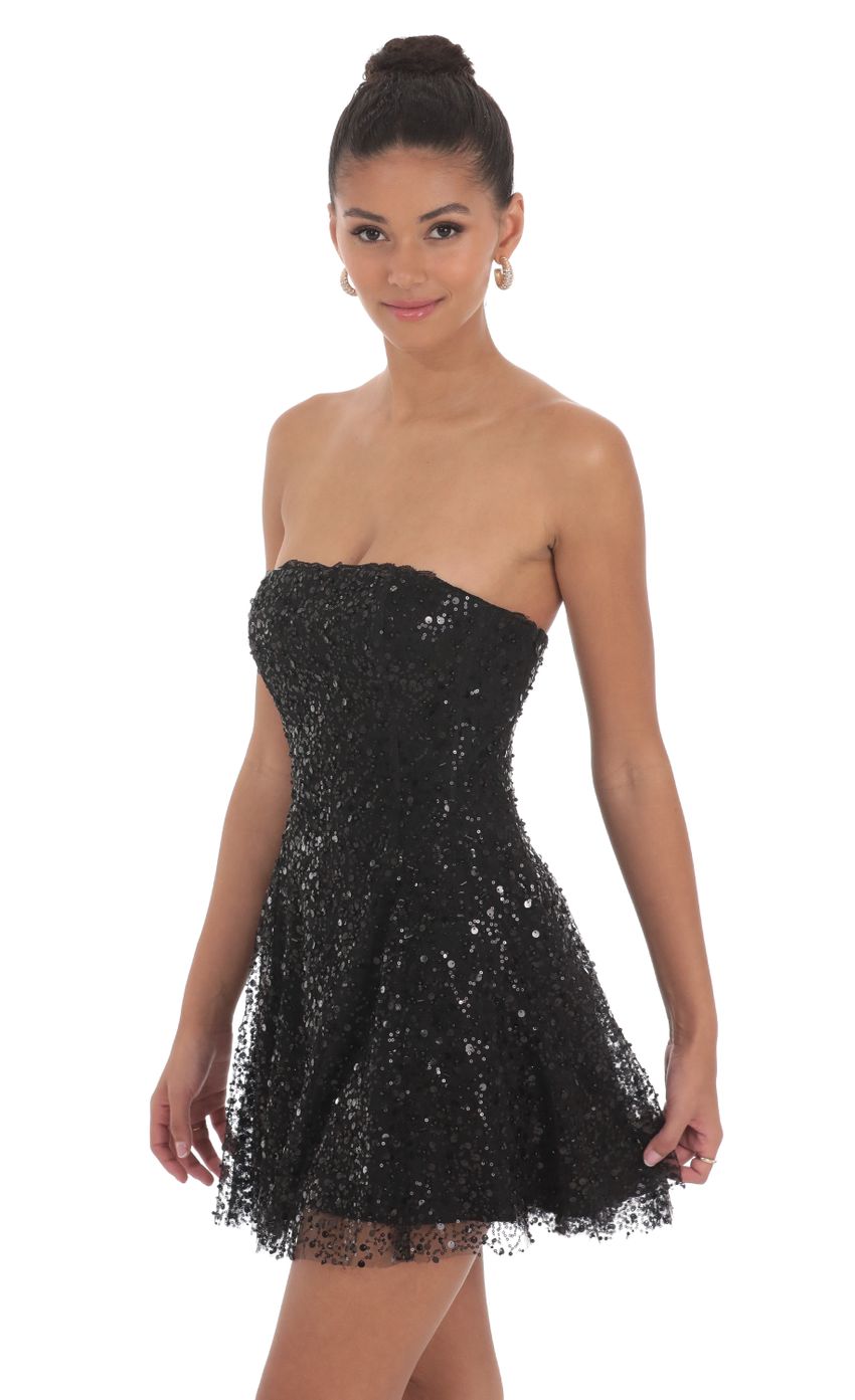 Picture Sequin Strapless A-line Dress in Black. Source: https://media-img.lucyinthesky.com/data/Jun24/850xAUTO/e784abc4-6c86-4fa4-8b9c-4331cb4cd533.jpg