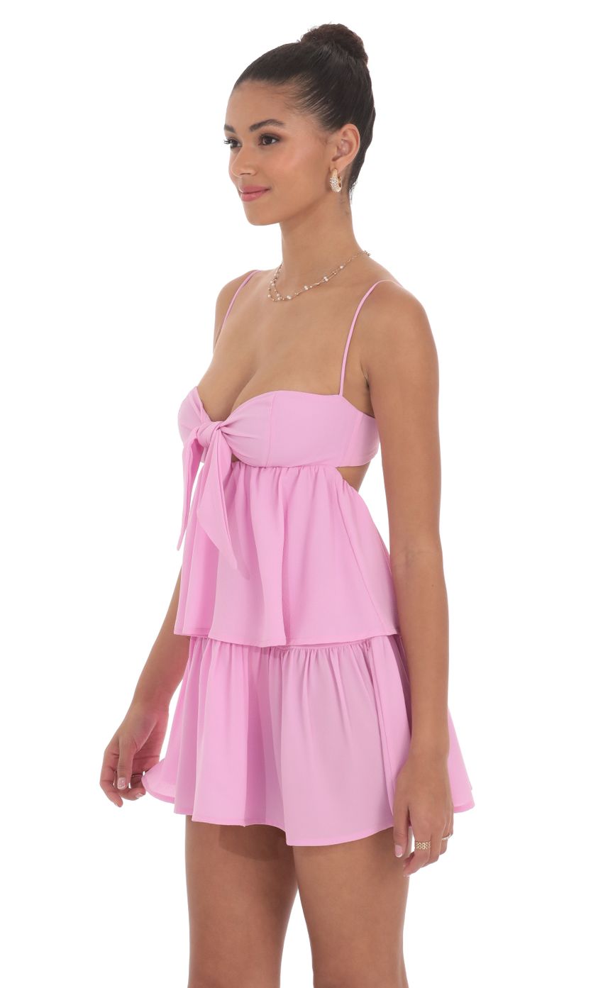 Picture Ruffle Front Tie Dress in Pink. Source: https://media-img.lucyinthesky.com/data/Jun24/850xAUTO/ee8eb709-af69-4573-a9a9-66695f6abebe.jpg