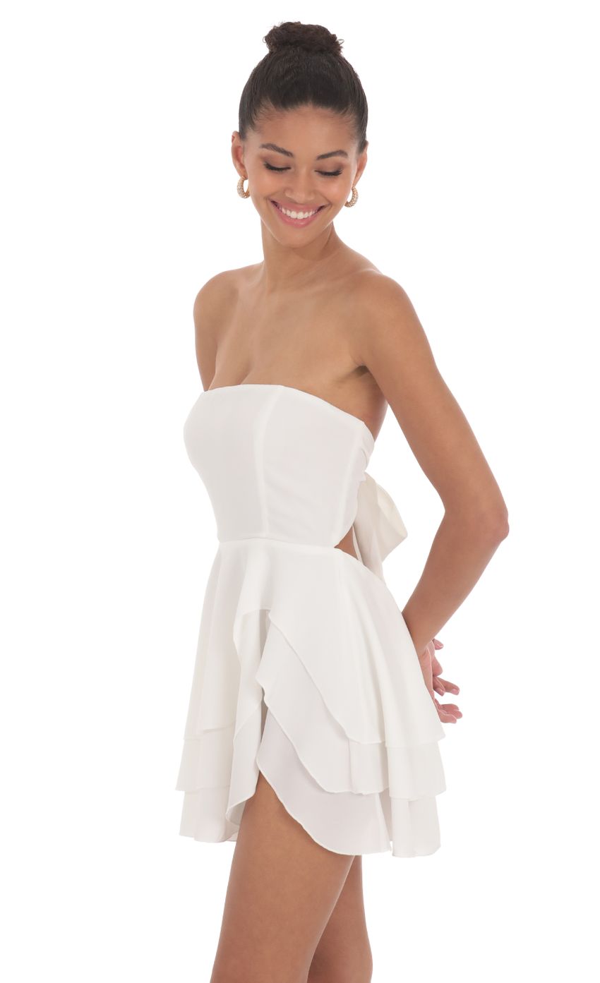 Picture Strapless Asymmetrical Dress in White. Source: https://media-img.lucyinthesky.com/data/Jun24/850xAUTO/f370a5ab-01d4-4917-b2b1-b7ea981497b1.jpg