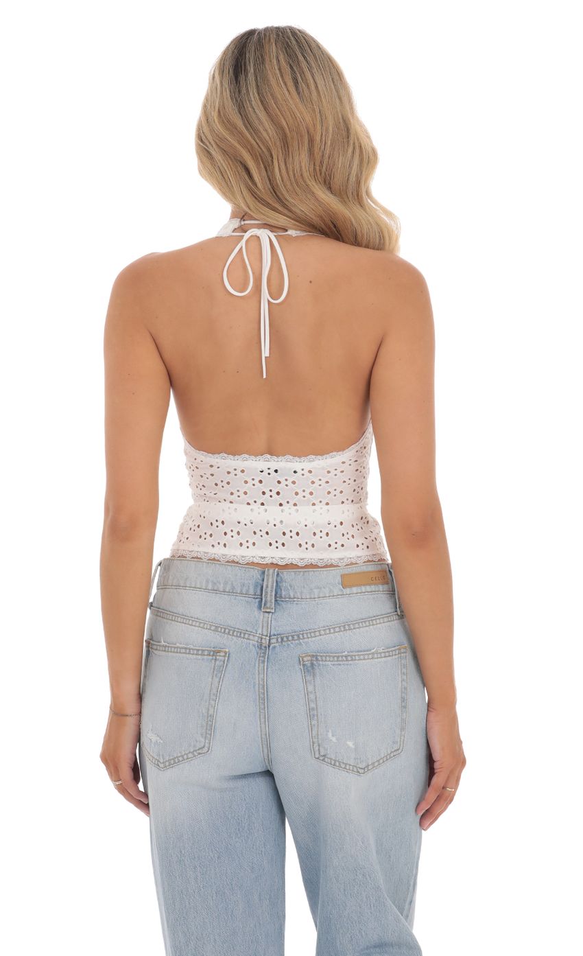 Picture Eyelet Plunge Neck Top in White. Source: https://media-img.lucyinthesky.com/data/Jun24/850xAUTO/fa0b5ae3-5dcc-42ca-8f29-f34c2cac9286.jpg