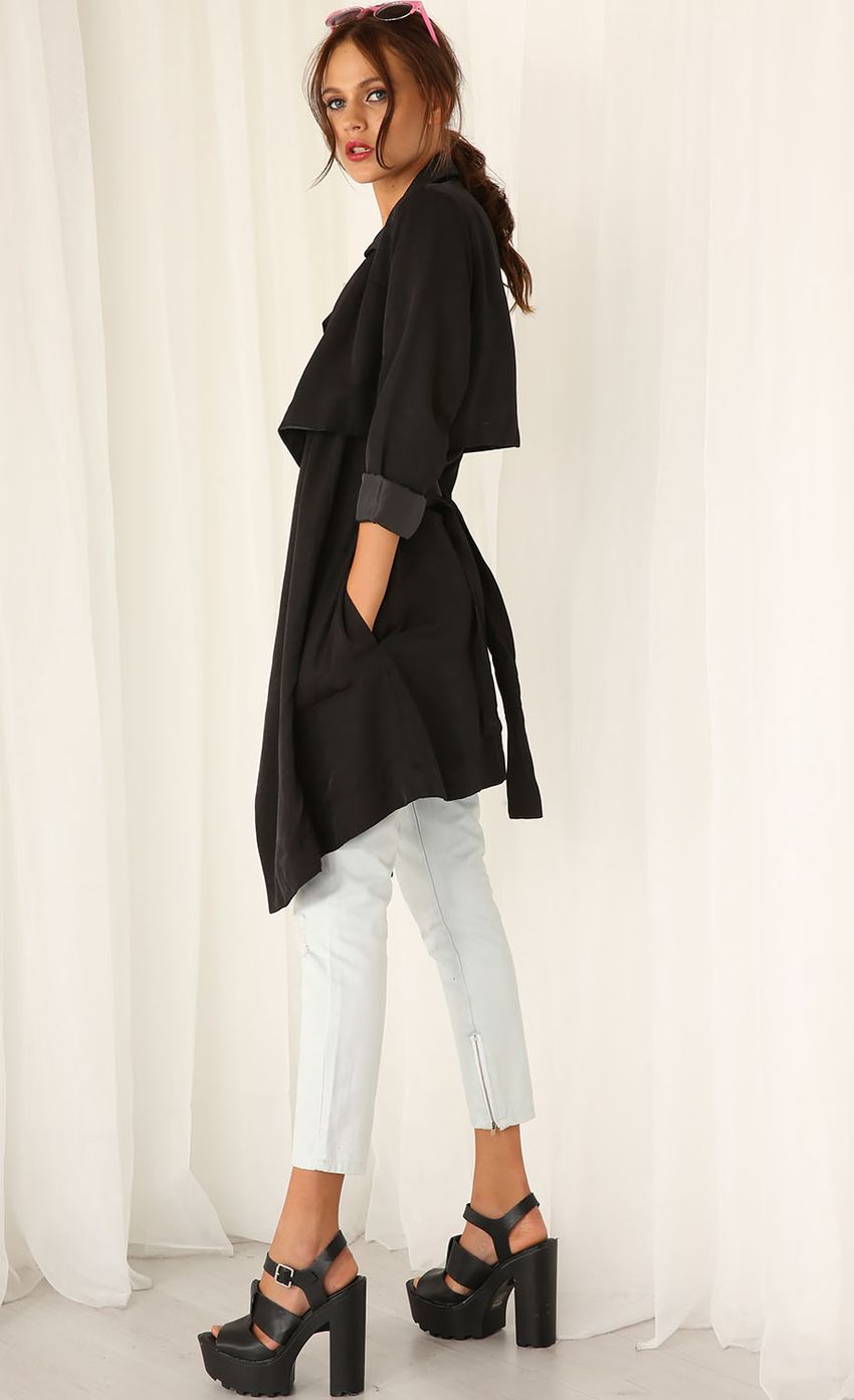 Picture Soft Black Trench Coat. Source: https://media-img.lucyinthesky.com/data/Mar15_1/850xAUTO/0Y5A1267.JPG