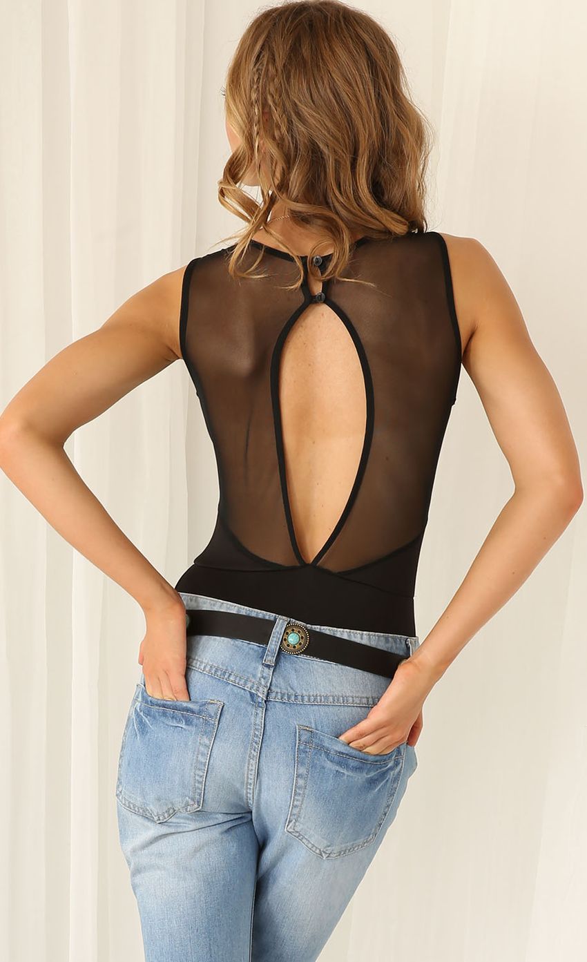 Picture Black Bodysuit With Sheer Panelling. Source: https://media-img.lucyinthesky.com/data/Mar15_1/850xAUTO/0Y5A54951.JPG