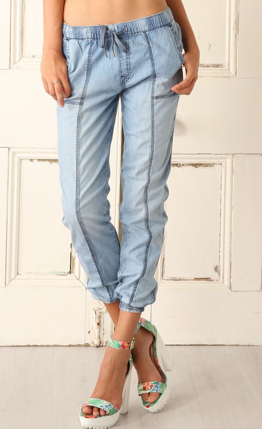 Picture Distressed Denim Pants With Elastic Detail. Source: https://media-img.lucyinthesky.com/data/Mar15_1/850xAUTO/0Y5A6618WAIST.JPG