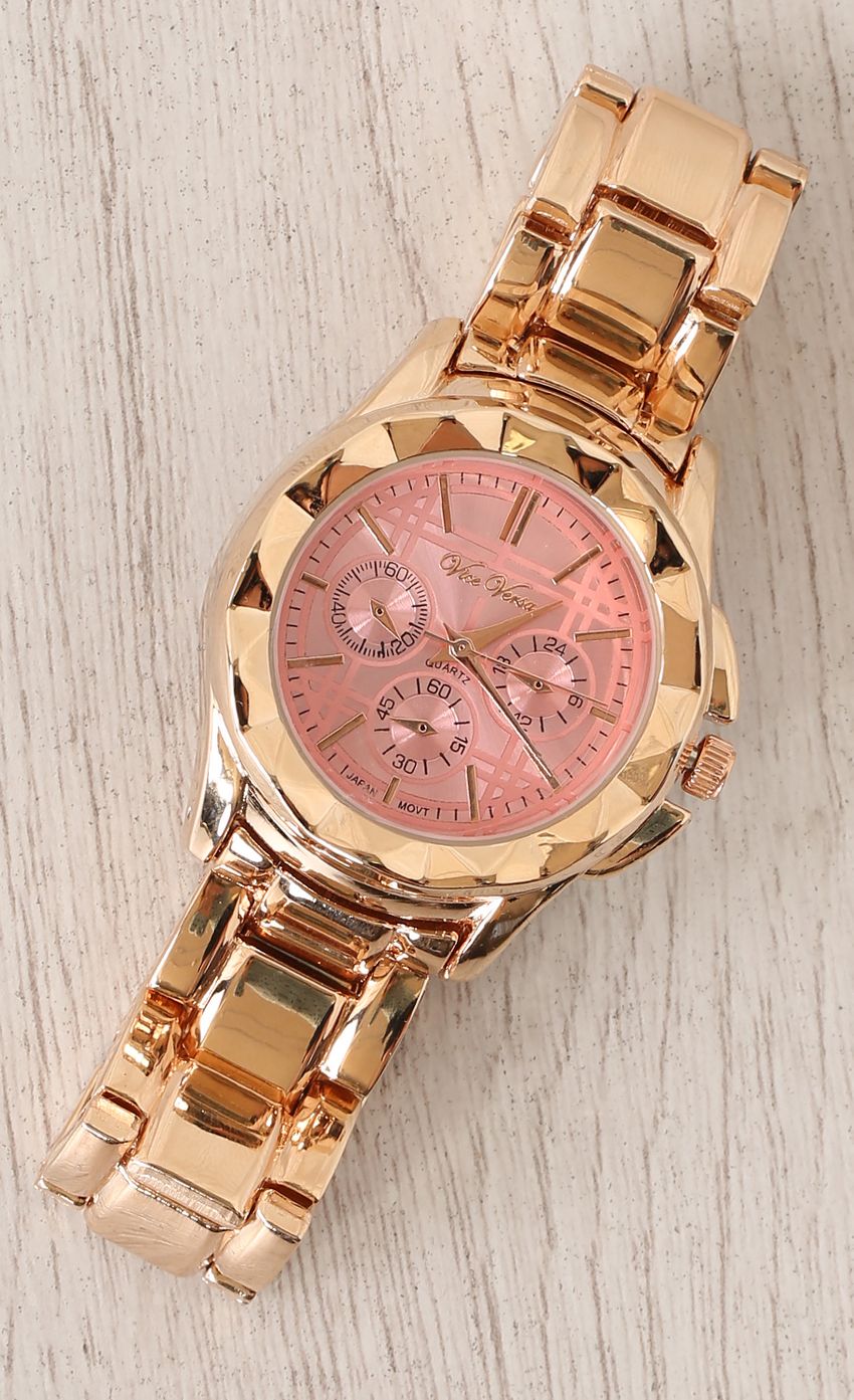 Picture Rose Gold Watch With Pink Face. Source: https://media-img.lucyinthesky.com/data/Mar15_1/850xAUTO/0Y5A8396.JPG