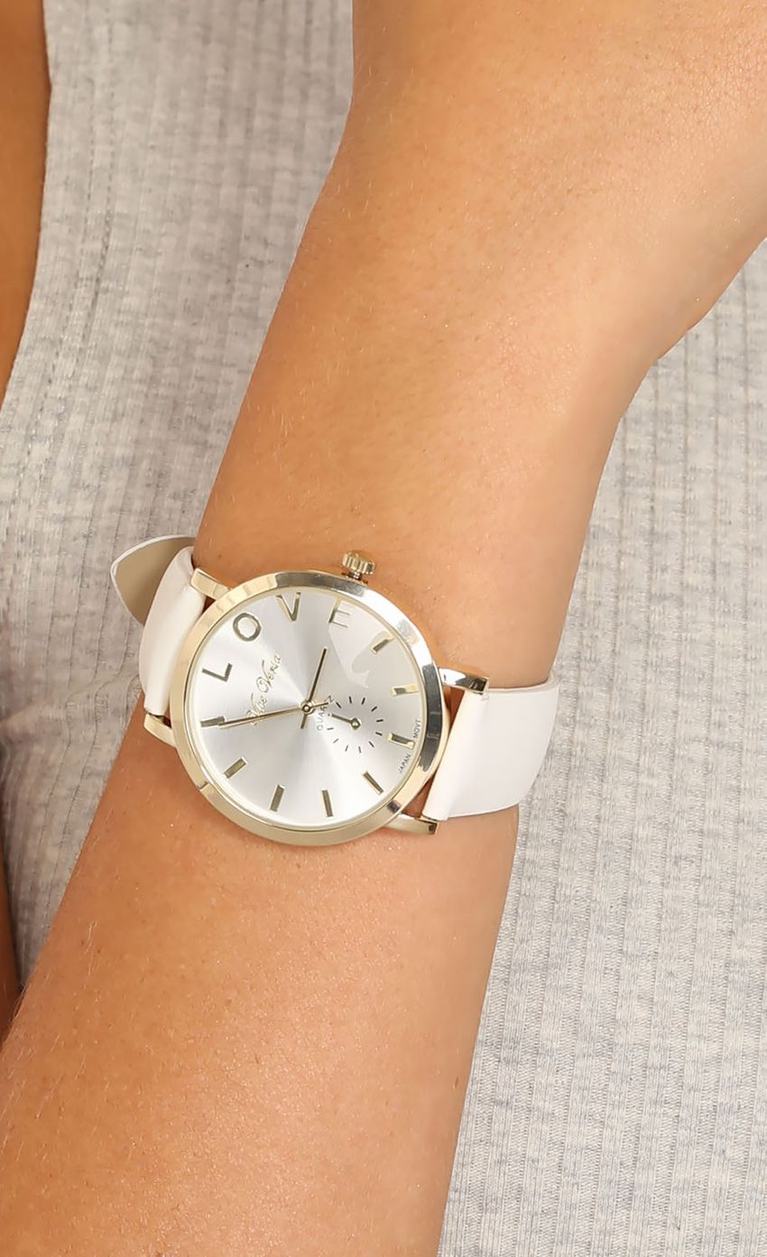 Picture White And Gold Love Watch. Source: https://media-img.lucyinthesky.com/data/Mar15_1/850xAUTO/0Y5A84351.JPG