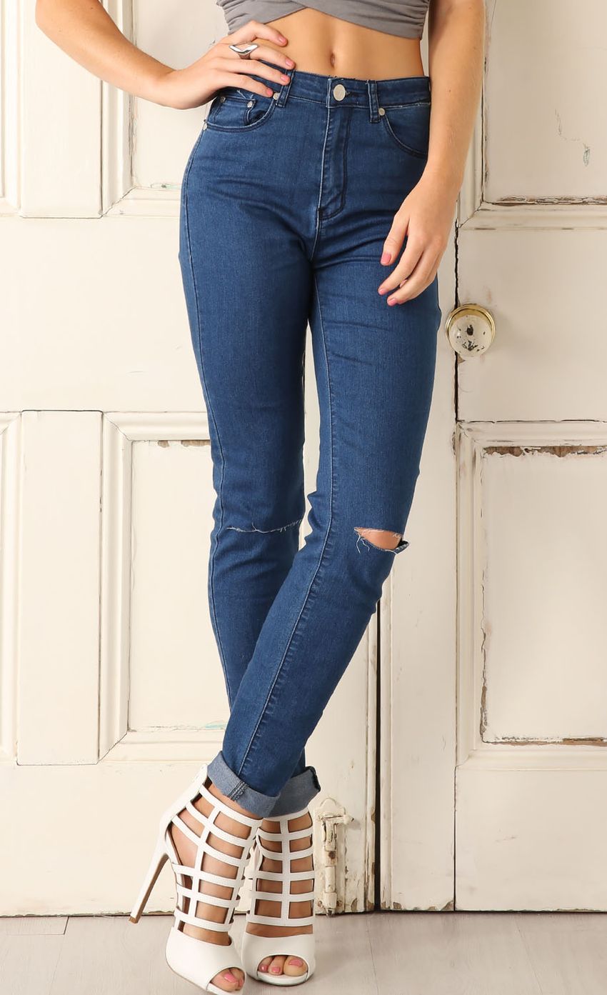 Picture Blue Denim Jeans With Rips. Source: https://media-img.lucyinthesky.com/data/Mar15_1/850xAUTO/0Y5A8867WAIST_N_SHAPE.JPG