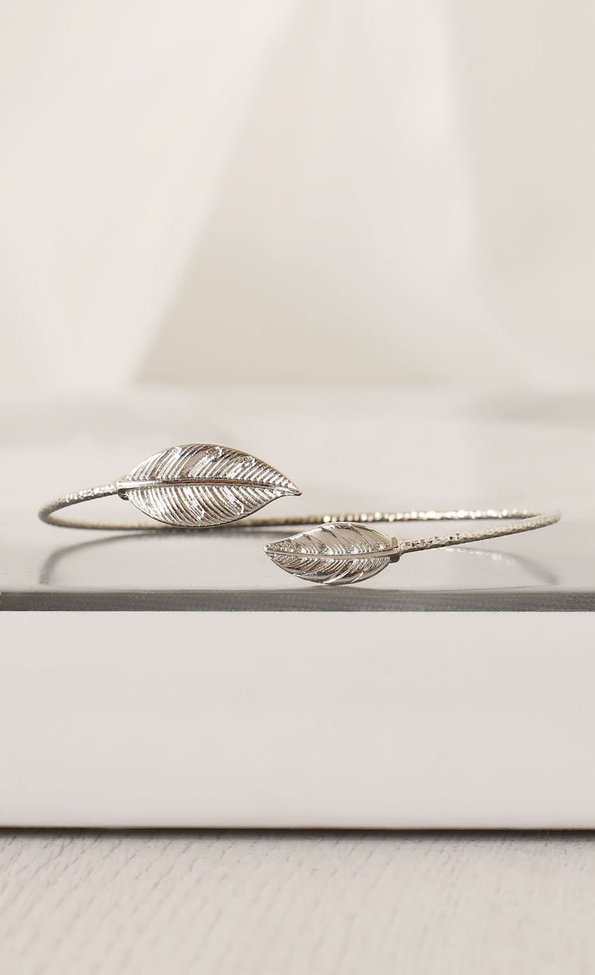 Picture Silver Accented Leaf Bangle. Source: https://media-img.lucyinthesky.com/data/Mar15_2/850xAUTO/0Y5A0320.JPG