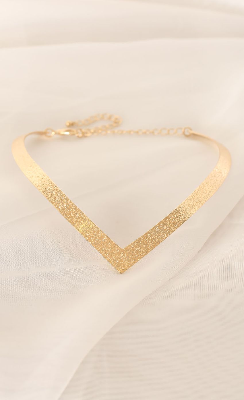 Picture Gold Accented Choker Necklace. Source: https://media-img.lucyinthesky.com/data/Mar15_2/850xAUTO/0Y5A8723.JPG