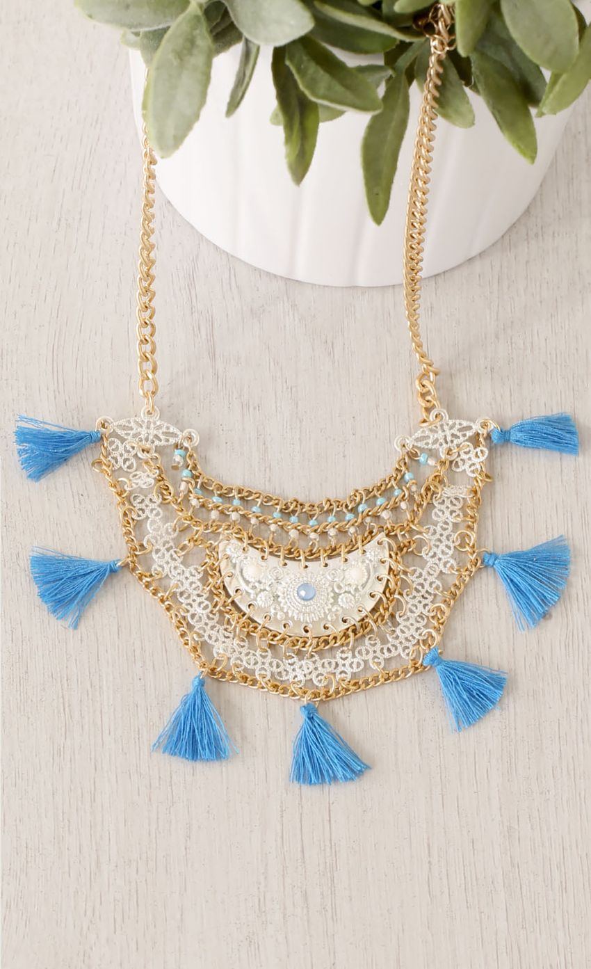 Picture Blue Tassel Detailed Necklace. Source: https://media-img.lucyinthesky.com/data/Mar15_2/850xAUTO/0Y5A9401.JPG