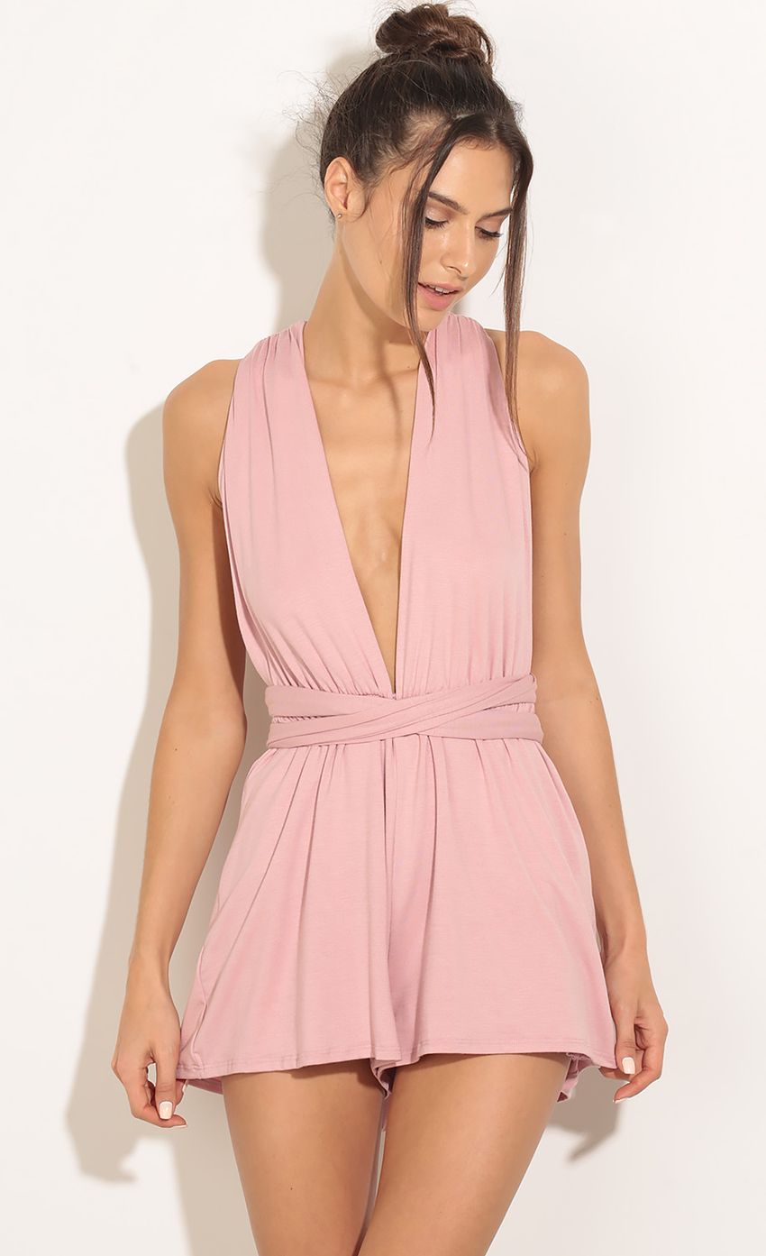 Picture Plunge Wrap-Up Romper In Pink. Source: https://media-img.lucyinthesky.com/data/Mar16_1/850xAUTO/0Y5A2821.JPG