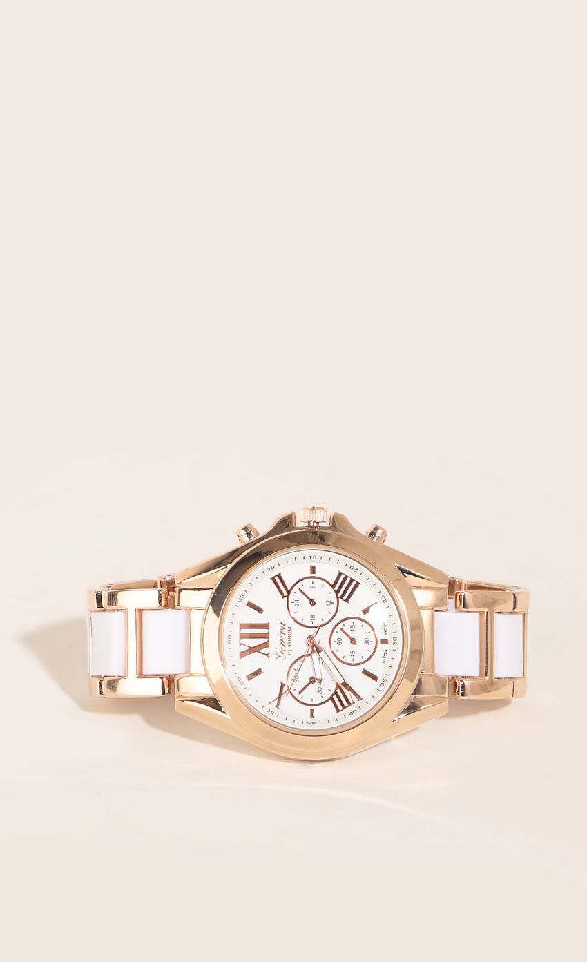 Picture Analog Watch In Gold And White. Source: https://media-img.lucyinthesky.com/data/Mar16_1/850xAUTO/0Y5A9099.JPG
