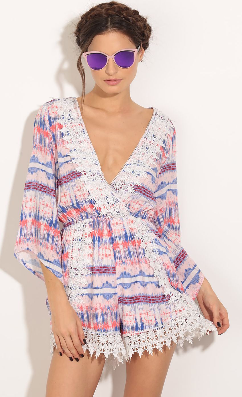 Picture Plunge Patterned Romper In Pink. Source: https://media-img.lucyinthesky.com/data/Mar16_2/850xAUTO/0Y5A0836.JPG