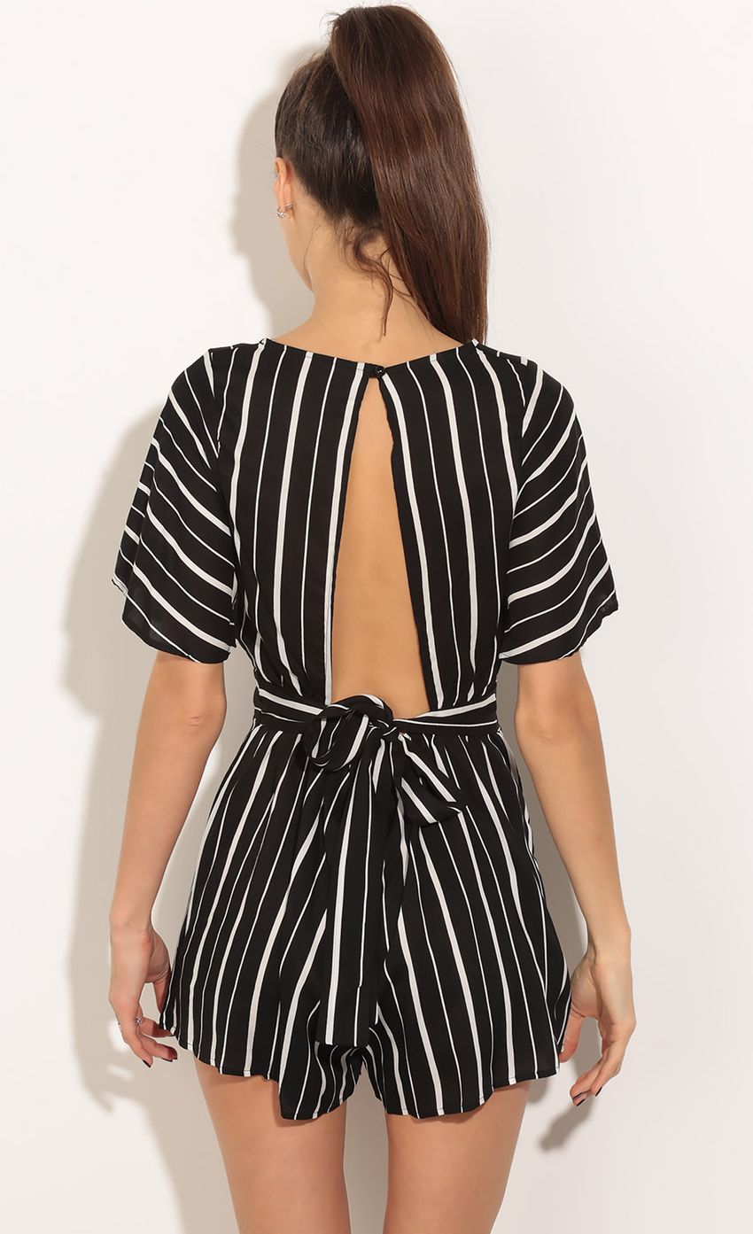 Picture Stripe Wrap Romper In Black. Source: https://media-img.lucyinthesky.com/data/Mar16_2/850xAUTO/0Y5A9228.JPG